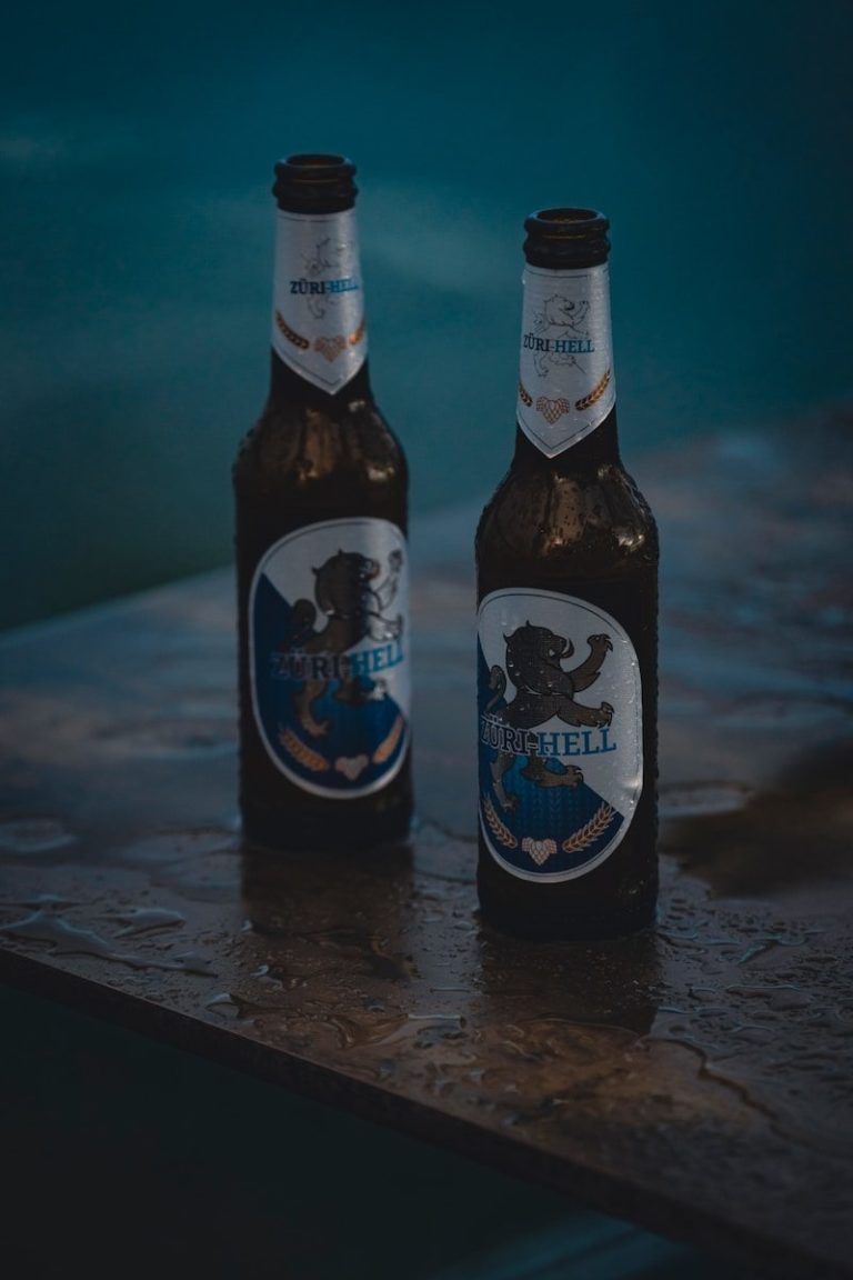 a couple of beer bottles on a table